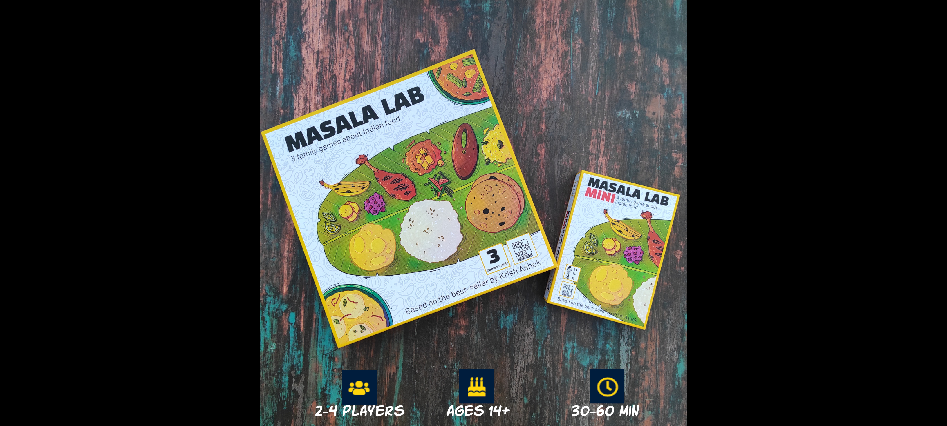 Boxes of the boardgame Masala Lab placed next to each other on a wooden background